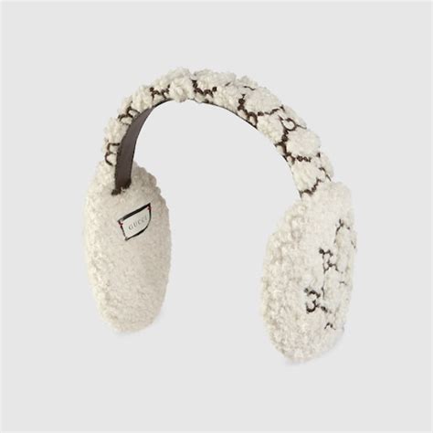 gucci textured ear muffs.